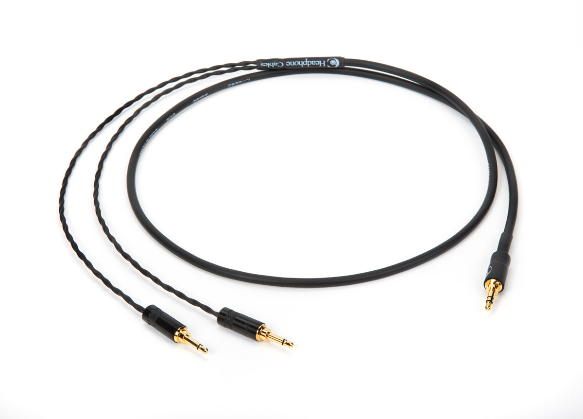 Close-up of 4ft Canare L-4E5C universal headphone cable with dual 3.5mm mono and 3.5mm TRS plug